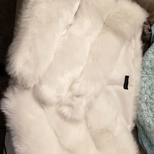Faux fur wrap with pockets